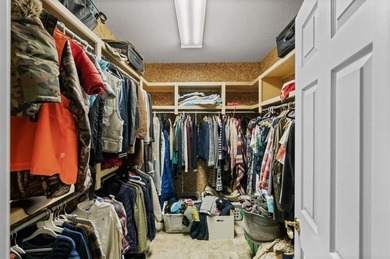 Welcome to 16750 S Village Drive, an elegant 4-bedroom, 2.5-bath on Loch Lloyd Country Club in Missouri - for sale on GolfHomes.com, golf home, golf lot