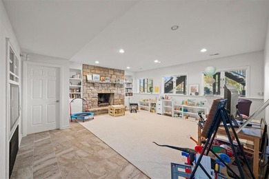 Welcome to 16750 S Village Drive, an elegant 4-bedroom, 2.5-bath on Loch Lloyd Country Club in Missouri - for sale on GolfHomes.com, golf home, golf lot