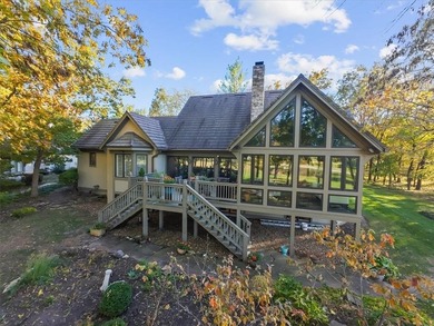 Welcome to 16750 S Village Drive, an elegant 4-bedroom, 2.5-bath on Loch Lloyd Country Club in Missouri - for sale on GolfHomes.com, golf home, golf lot