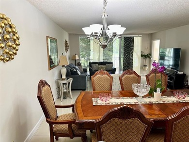 Welcome to this bright and spacious second-floor 3-bedroom on Palm-Aire Country Club and Resort - Palms in Florida - for sale on GolfHomes.com, golf home, golf lot