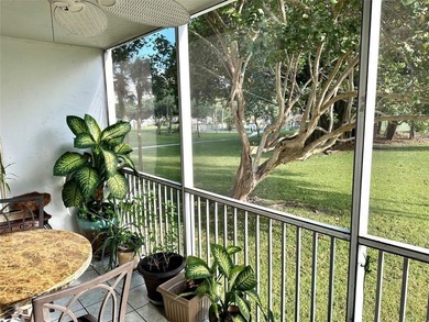 Welcome to this bright and spacious second-floor 3-bedroom on Palm-Aire Country Club and Resort - Palms in Florida - for sale on GolfHomes.com, golf home, golf lot