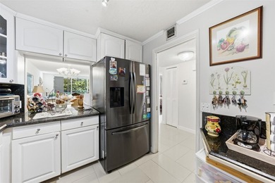 Welcome to this bright and spacious second-floor 3-bedroom on Palm-Aire Country Club and Resort - Palms in Florida - for sale on GolfHomes.com, golf home, golf lot