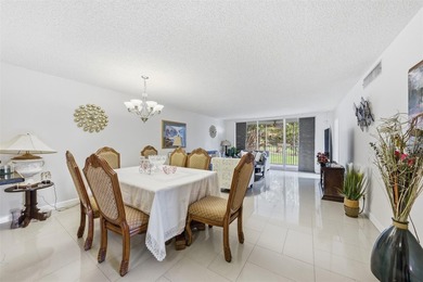 Welcome to this bright and spacious second-floor 3-bedroom on Palm-Aire Country Club and Resort - Palms in Florida - for sale on GolfHomes.com, golf home, golf lot