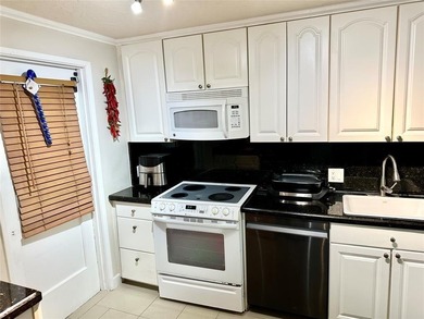 Welcome to this bright and spacious second-floor 3-bedroom on Palm-Aire Country Club and Resort - Palms in Florida - for sale on GolfHomes.com, golf home, golf lot