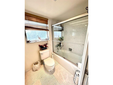 Welcome to this bright and spacious second-floor 3-bedroom on Palm-Aire Country Club and Resort - Palms in Florida - for sale on GolfHomes.com, golf home, golf lot