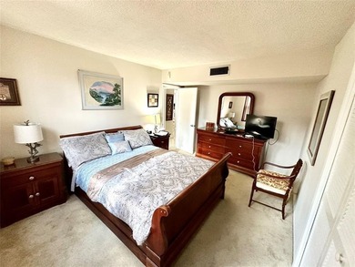 Welcome to this bright and spacious second-floor 3-bedroom on Palm-Aire Country Club and Resort - Palms in Florida - for sale on GolfHomes.com, golf home, golf lot