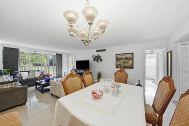 Welcome to this bright and spacious second-floor 3-bedroom on Palm-Aire Country Club and Resort - Palms in Florida - for sale on GolfHomes.com, golf home, golf lot