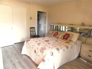 Clean and bright FIRST FLOOR 2/2 condo in wooded golf community on Vero Beach South Golf Course in Florida - for sale on GolfHomes.com, golf home, golf lot