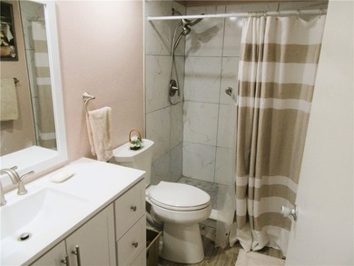 Clean and bright FIRST FLOOR 2/2 condo in wooded golf community on Vero Beach South Golf Course in Florida - for sale on GolfHomes.com, golf home, golf lot