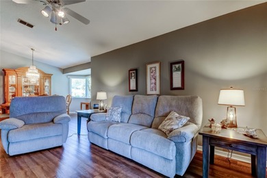 IF YOU ARE LOOKIG FOR AMAZING, WE'VE GOT IT! This move in ready on Meadow Oaks Golf and Country Club in Florida - for sale on GolfHomes.com, golf home, golf lot