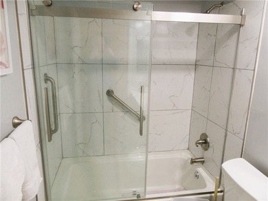 Clean and bright FIRST FLOOR 2/2 condo in wooded golf community on Vero Beach South Golf Course in Florida - for sale on GolfHomes.com, golf home, golf lot