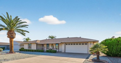 GREAT LOCATION AND SENSATIONALLY MAINTAINED! This Sun City Gem on Sun City Lakes West and East in Arizona - for sale on GolfHomes.com, golf home, golf lot