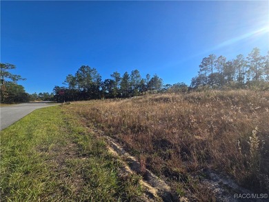 This cleared corner lot on a paved road in beautiful Citrus on Pine Ridge Community Golf and Country Club in Florida - for sale on GolfHomes.com, golf home, golf lot