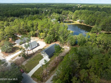 Built in 2024, this beautifully designed home offers the perfect on The Lakes Country Club in North Carolina - for sale on GolfHomes.com, golf home, golf lot