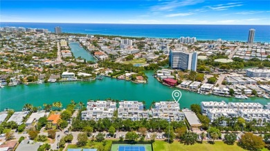 Indulge in waterfront luxury with this elegant 3Bed/3.5Bath on Normandy Shores Golf Course in Florida - for sale on GolfHomes.com, golf home, golf lot