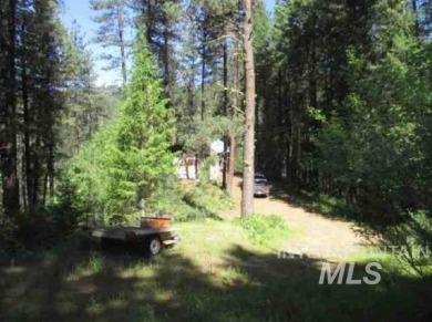A CREEK RUNS THROUGH IT and you'll be 150' from the Middle Fork on Terrace Lakes Golf Resort in Idaho - for sale on GolfHomes.com, golf home, golf lot