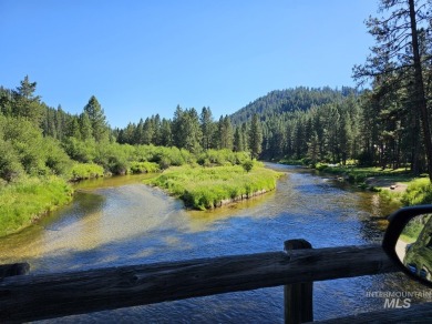 A CREEK RUNS THROUGH IT and you'll be 150' from the Middle Fork on Terrace Lakes Golf Resort in Idaho - for sale on GolfHomes.com, golf home, golf lot