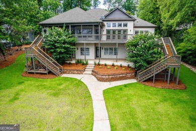 Experience refined lakefront living at its finest at 1390 Winged on Harbor Club Golf and Country Club in Georgia - for sale on GolfHomes.com, golf home, golf lot