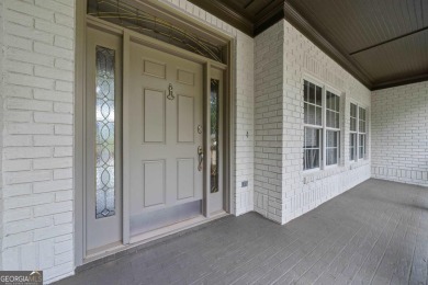 Experience refined lakefront living at its finest at 1390 Winged on Harbor Club Golf and Country Club in Georgia - for sale on GolfHomes.com, golf home, golf lot