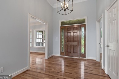 Experience refined lakefront living at its finest at 1390 Winged on Harbor Club Golf and Country Club in Georgia - for sale on GolfHomes.com, golf home, golf lot