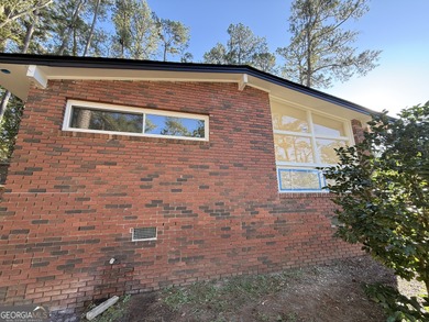 Discover modern living in the heart of Lakewood with this on Browns Mill Golf Course in Georgia - for sale on GolfHomes.com, golf home, golf lot