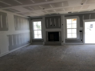 Discover Southern elegance in this exquisite Wescott Elevation A on Woodside Plantation Country Club in South Carolina - for sale on GolfHomes.com, golf home, golf lot