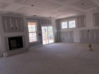 Discover Southern elegance in this exquisite Wescott Elevation A on Woodside Plantation Country Club in South Carolina - for sale on GolfHomes.com, golf home, golf lot