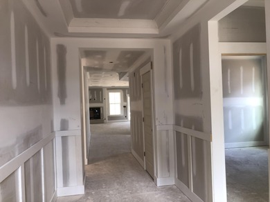 Discover Southern elegance in this exquisite Wescott Elevation A on Woodside Plantation Country Club in South Carolina - for sale on GolfHomes.com, golf home, golf lot