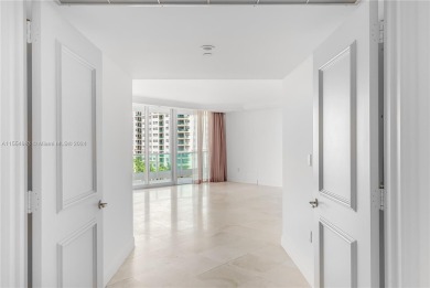 A private entrance foyer leads you into a spacious condo with on Turnberry Isle Resort and Club in Florida - for sale on GolfHomes.com, golf home, golf lot