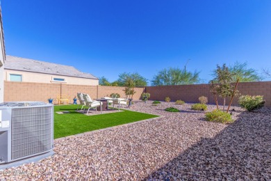 OWNED SOLAR! The owned solar system ensures energy efficiency on Poston Butte Golf Club in Arizona - for sale on GolfHomes.com, golf home, golf lot