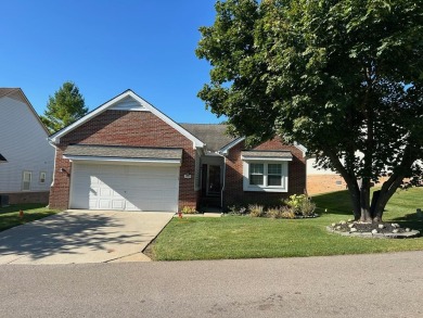 Carefree living in spacious condo with best location in the on The Maples Club in Michigan - for sale on GolfHomes.com, golf home, golf lot