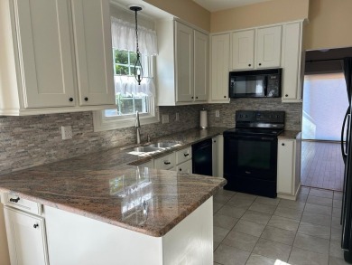 Carefree living in spacious condo with best location in the on The Maples Club in Michigan - for sale on GolfHomes.com, golf home, golf lot
