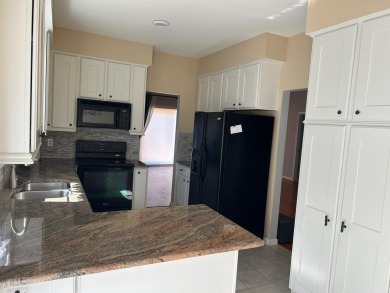 Carefree living in spacious condo with best location in the on The Maples Club in Michigan - for sale on GolfHomes.com, golf home, golf lot