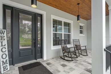 New Construction Luxury Living in Southern Hills! This stunning on Southern Hills Plantation Club in Florida - for sale on GolfHomes.com, golf home, golf lot