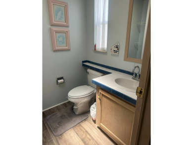 Charming 2-Bedroom PH Home  - Almost Fully Furnished & Golf Cart on Schalamar Creek Golf and Country Club in Florida - for sale on GolfHomes.com, golf home, golf lot