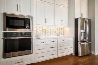 Step into luxury with the sought-after Madison II Reverse by Don on Staley Farms Golf Club in Missouri - for sale on GolfHomes.com, golf home, golf lot