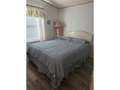 Charming 2-Bedroom PH Home  - Almost Fully Furnished & Golf Cart on Schalamar Creek Golf and Country Club in Florida - for sale on GolfHomes.com, golf home, golf lot
