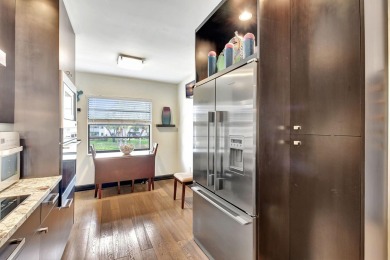 Beautifully updated second-floor, two-bedroom, two-bath on Hunters Run Golf and Country Club in Florida - for sale on GolfHomes.com, golf home, golf lot