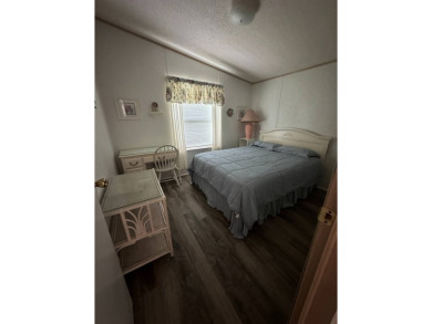 Charming 2-Bedroom PH Home  - Almost Fully Furnished & Golf Cart on Schalamar Creek Golf and Country Club in Florida - for sale on GolfHomes.com, golf home, golf lot