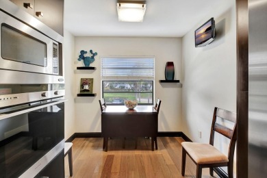 Beautifully updated second-floor, two-bedroom, two-bath on Hunters Run Golf and Country Club in Florida - for sale on GolfHomes.com, golf home, golf lot