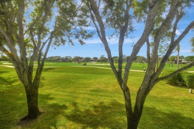 Beautifully updated second-floor, two-bedroom, two-bath on Hunters Run Golf and Country Club in Florida - for sale on GolfHomes.com, golf home, golf lot