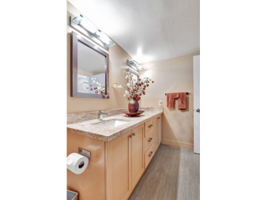 Beautifully updated second-floor, two-bedroom, two-bath on Hunters Run Golf and Country Club in Florida - for sale on GolfHomes.com, golf home, golf lot