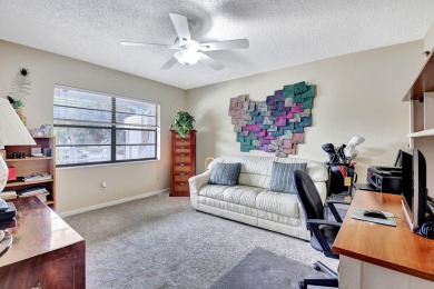 Beautifully updated second-floor, two-bedroom, two-bath on Hunters Run Golf and Country Club in Florida - for sale on GolfHomes.com, golf home, golf lot