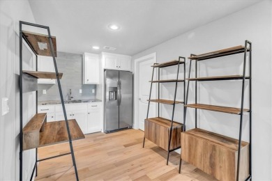 Step into luxury with the sought-after Madison II Reverse by Don on Staley Farms Golf Club in Missouri - for sale on GolfHomes.com, golf home, golf lot