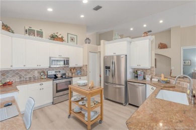 Beautiful 3 bedrooms, 2 bathrooms and an oversized 2 car garage on Santa Lucia River Club in Florida - for sale on GolfHomes.com, golf home, golf lot
