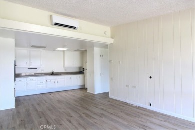 Step into this delightful, expanded one-bedroom, one-bathroom on Leisure World Seal Beach Golf Course in California - for sale on GolfHomes.com, golf home, golf lot