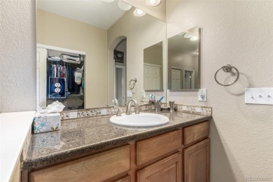 Welcome to this immaculately maintained ranch-style townhome in on Saddle Rock Golf Course in Colorado - for sale on GolfHomes.com, golf home, golf lot