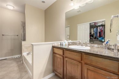 Welcome to this immaculately maintained ranch-style townhome in on Saddle Rock Golf Course in Colorado - for sale on GolfHomes.com, golf home, golf lot