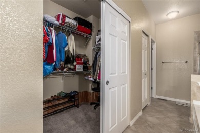 Welcome to this immaculately maintained ranch-style townhome in on Saddle Rock Golf Course in Colorado - for sale on GolfHomes.com, golf home, golf lot