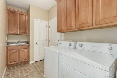 Welcome to this immaculately maintained ranch-style townhome in on Saddle Rock Golf Course in Colorado - for sale on GolfHomes.com, golf home, golf lot